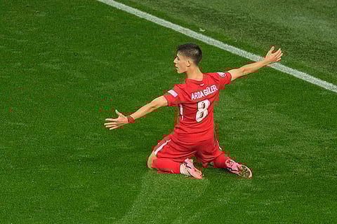 Turkey's Arda Guler celebrates after scoring his side's second goal